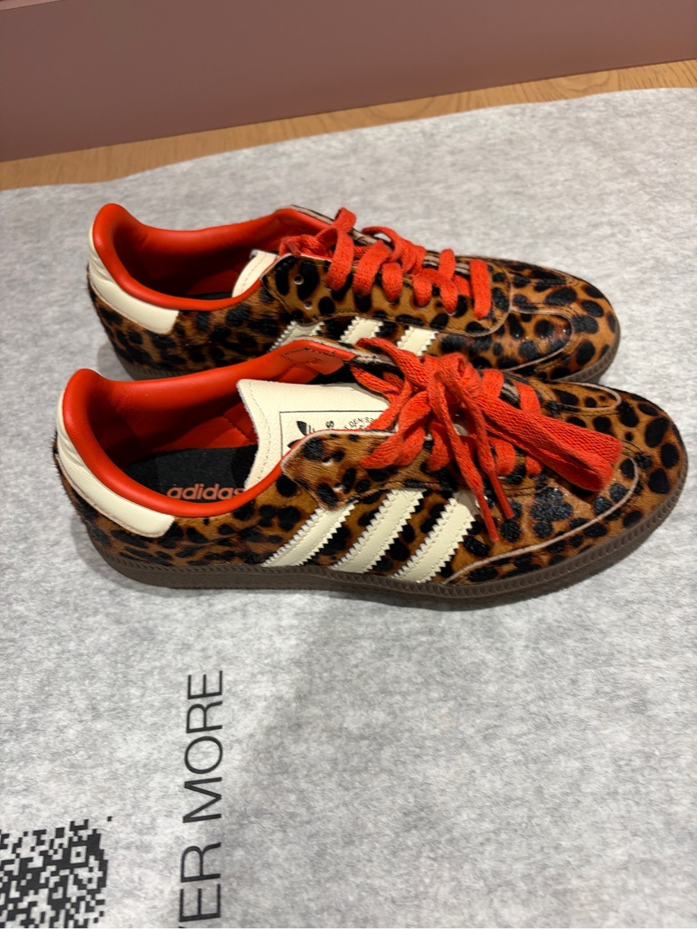 adidas Women’s Leopard Print Sneakers with Orange Accents
